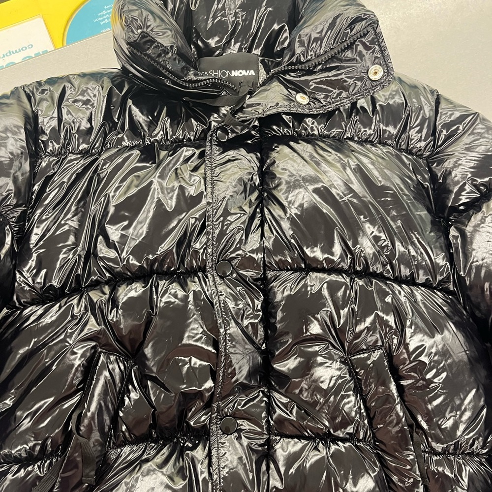 Black Fashion Nova puffer jacket.